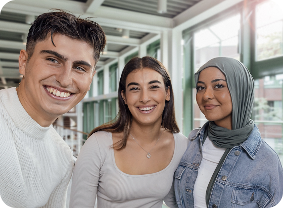 bp students smiling in campus hallway, highlighting diversity, inclusion, and career opportunities.