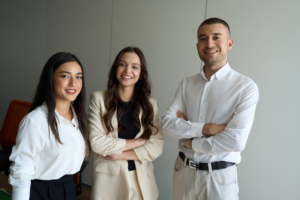 bp interns smiling in office, highlighting early careers, learning, and professional development.