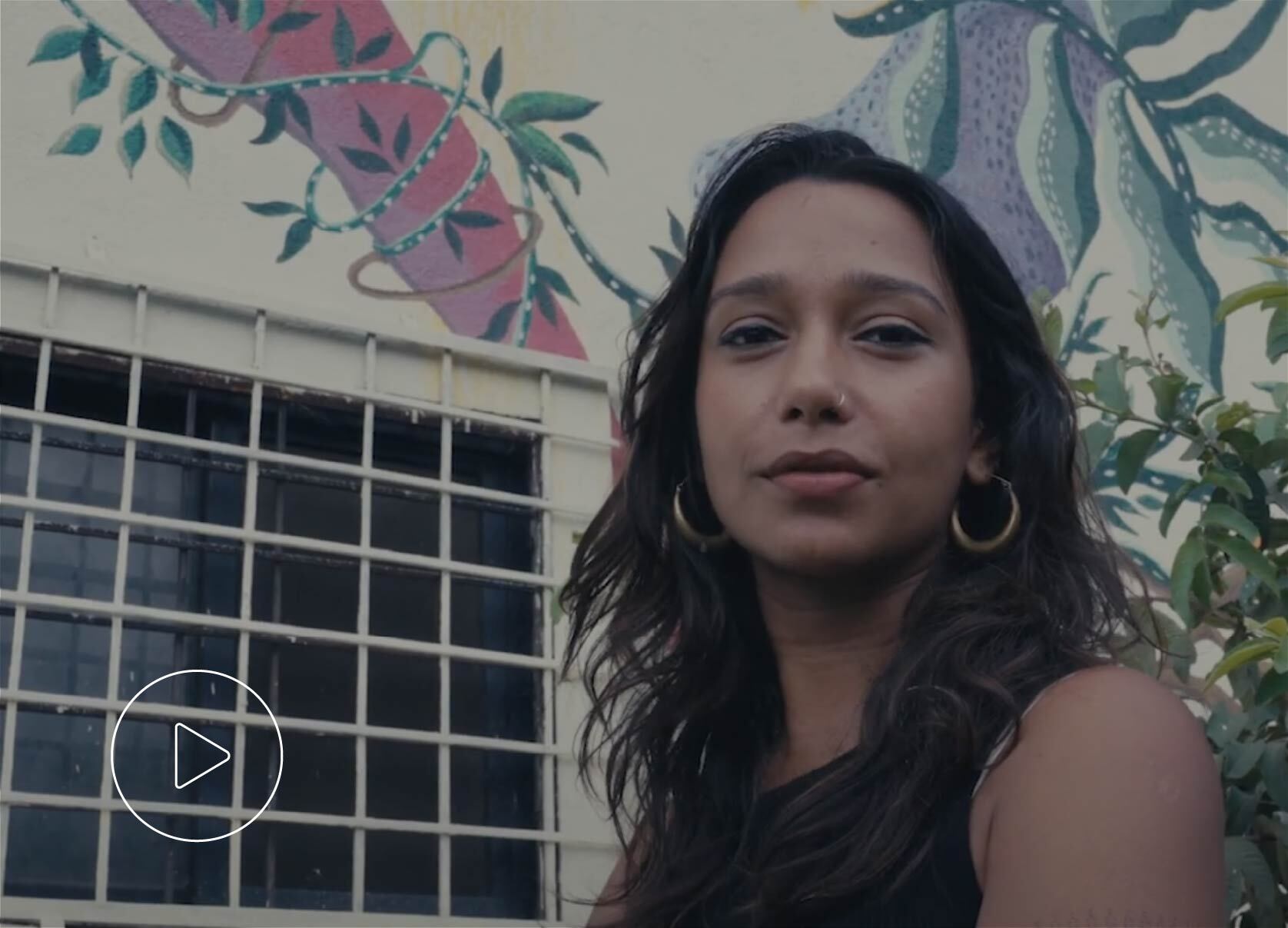 Woman smiling video thumbnail.