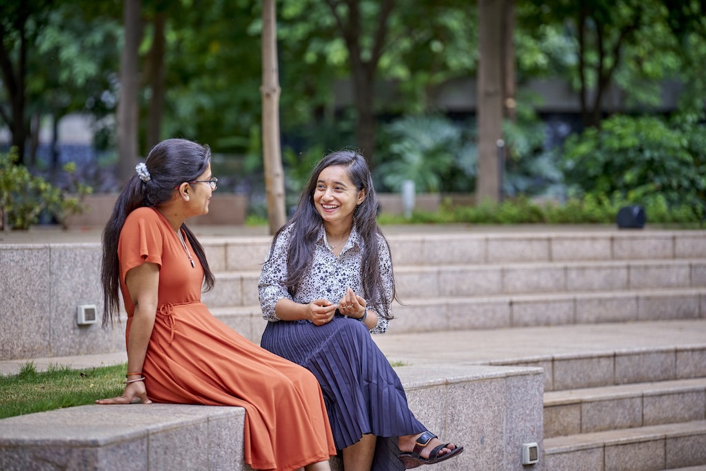 bp interns outdoors on campus steps, highlighting career growth, learning, and internship opportunities.
